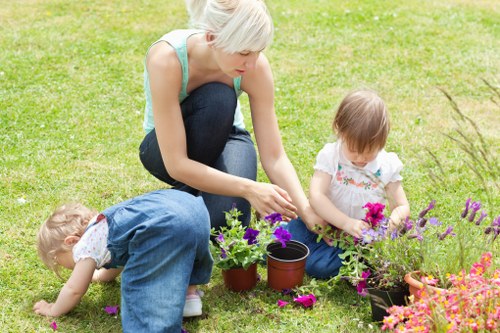 Low-maintenance soft landscaping finished with mulch, borders, and seasonal plants in Penge